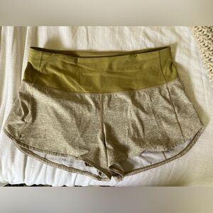 Lululemon speed up high waisted 2.5” shorts.